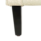 Fauteuil club gris à motif de jardin