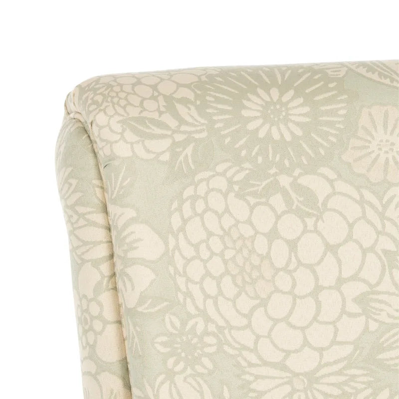 Fauteuil club gris à motif de jardin